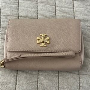 Tory Burch Pink Clutch with Gold Accents. In good condition